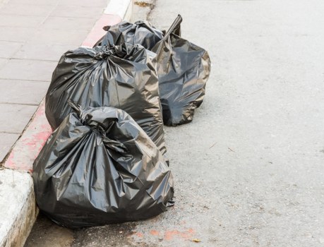 Professional team managing business waste in an office